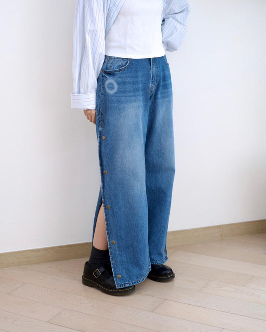 韓國鈕扣彎刀牛仔褲