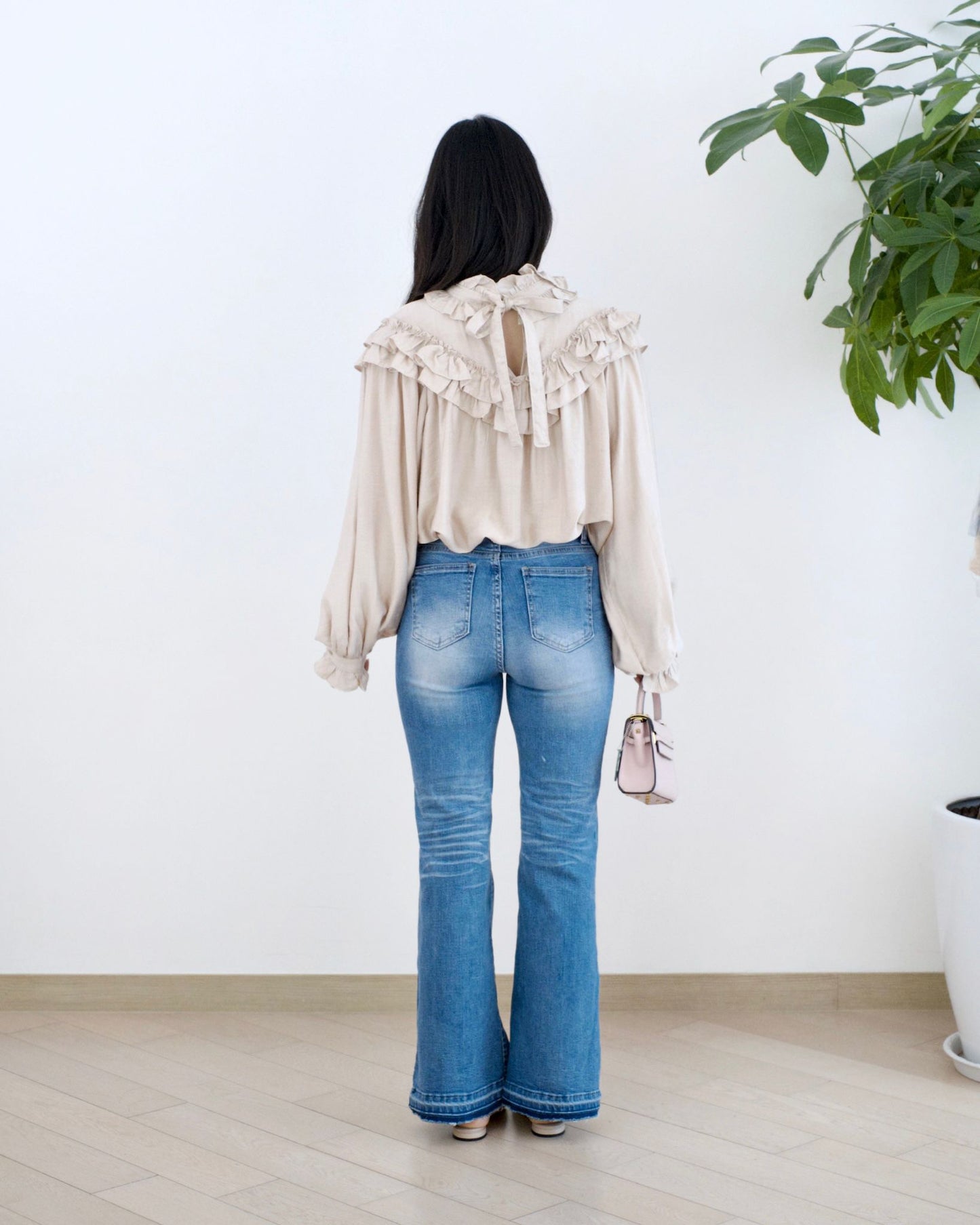 Howluk 毛邊微喇叭牛仔褲