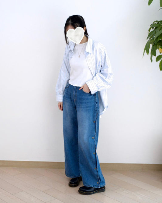 韓國鈕扣彎刀牛仔褲