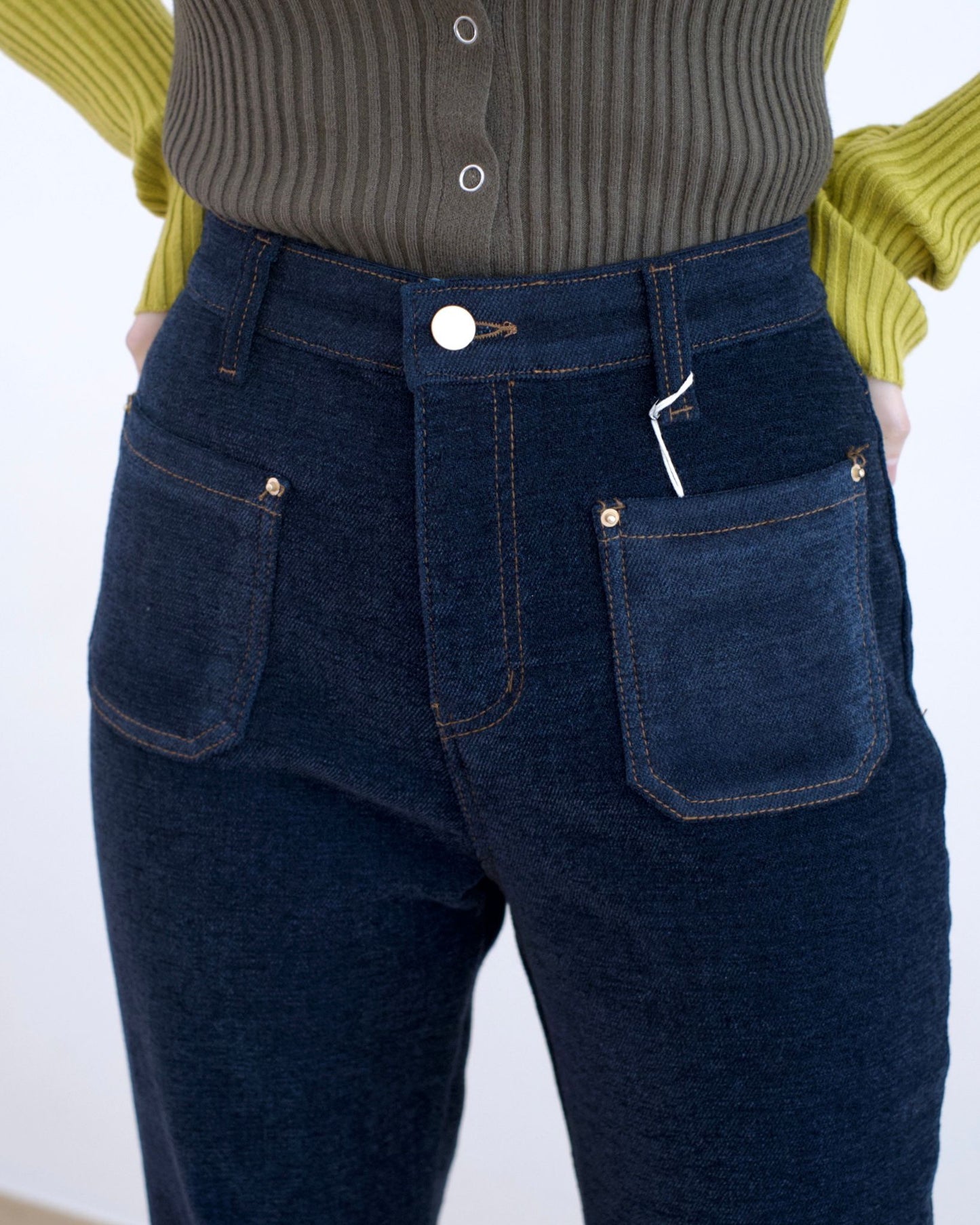 Howluk 口袋絨毛喇叭牛仔褲