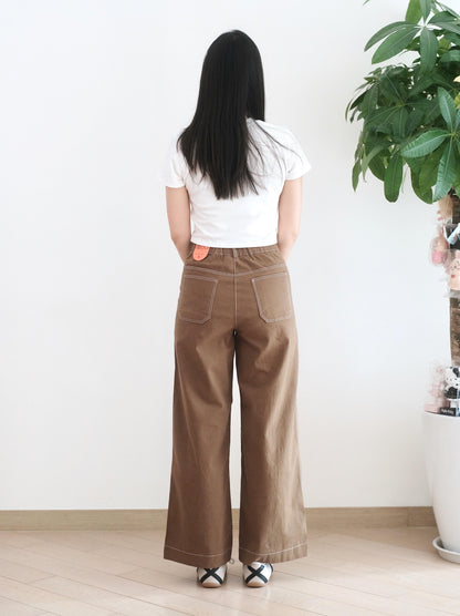 Moci 鈕扣口袋直筒扯布褲